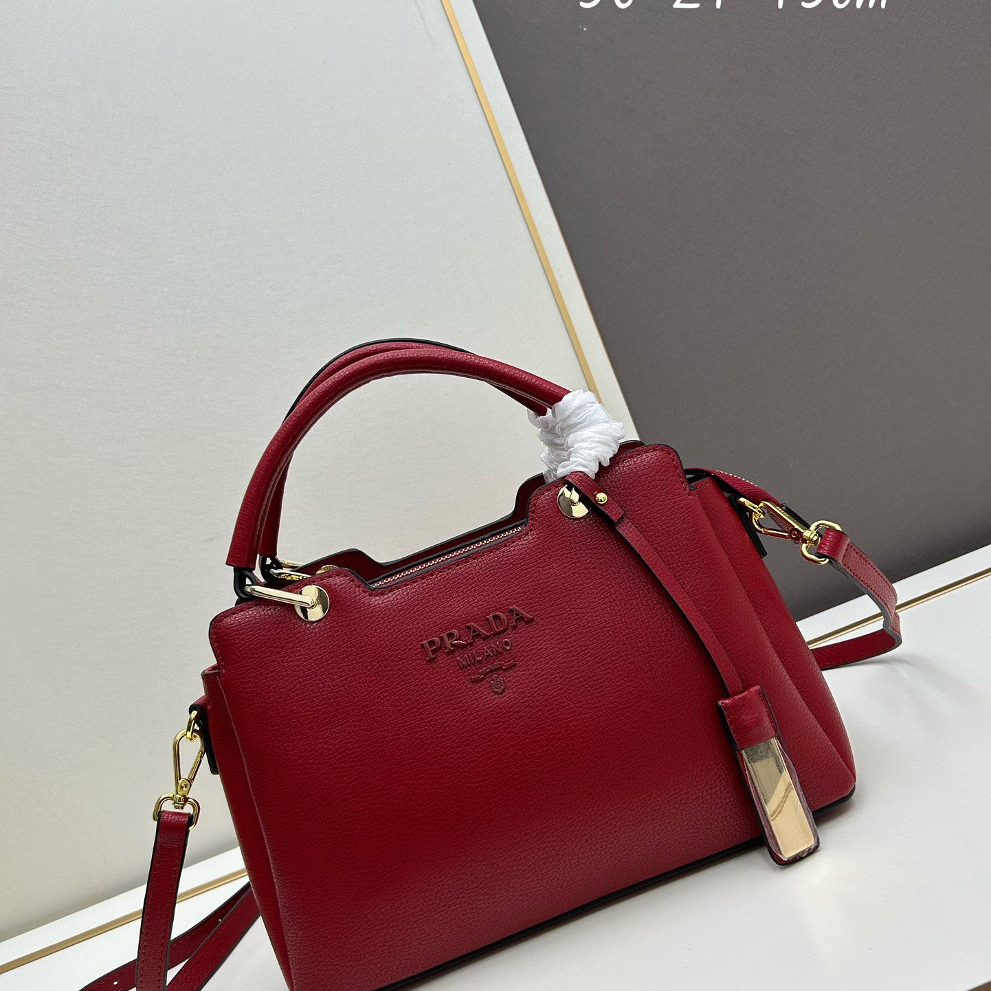Pra*a top handle bags